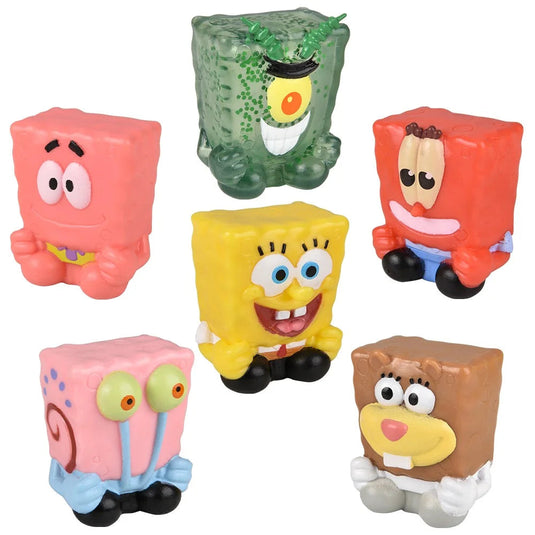 Set of colorful cartoon character figurines on a white background