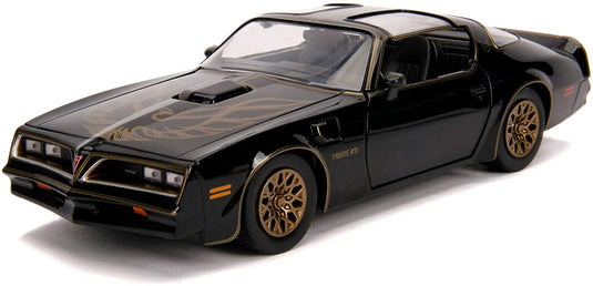 Hollywood Rides - Smokey and The Bandit Pontiac T-Top (1977, modèle de voiture moulé sous pression à l'échelle 1/32, noir/or) 